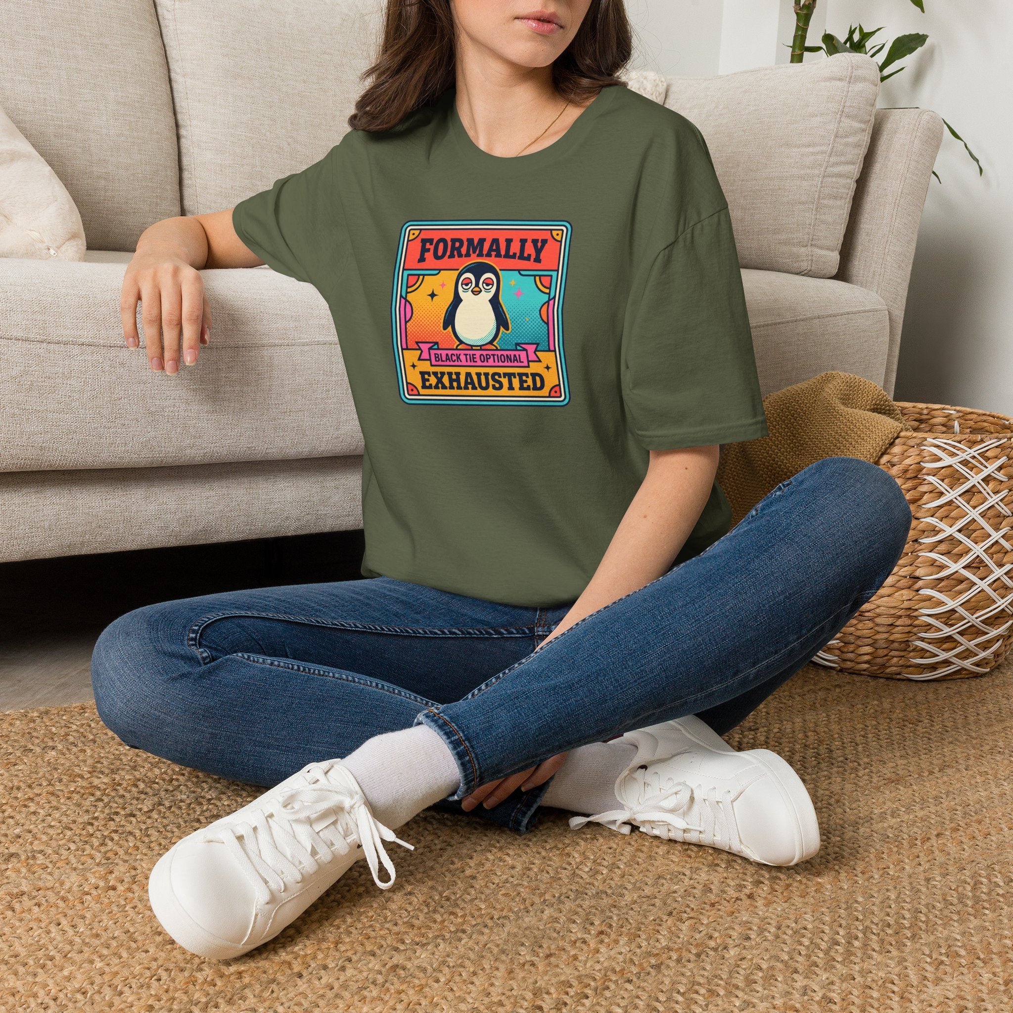 Dark green crew-neck T-shirt with colorful penguin “Formally Exhausted” graphic.