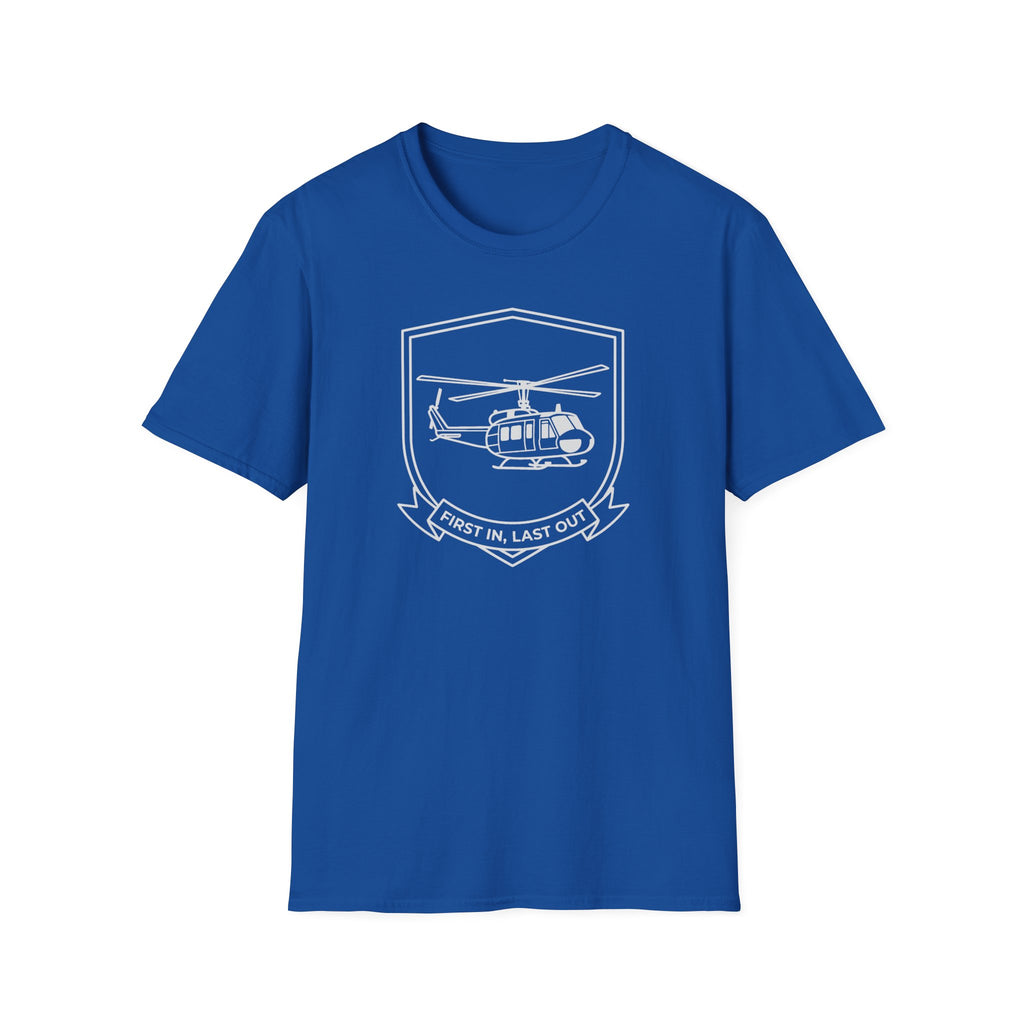 Royal blue T-shirt with white helicopter badge graphic and ribbon “First In, Last Out”.