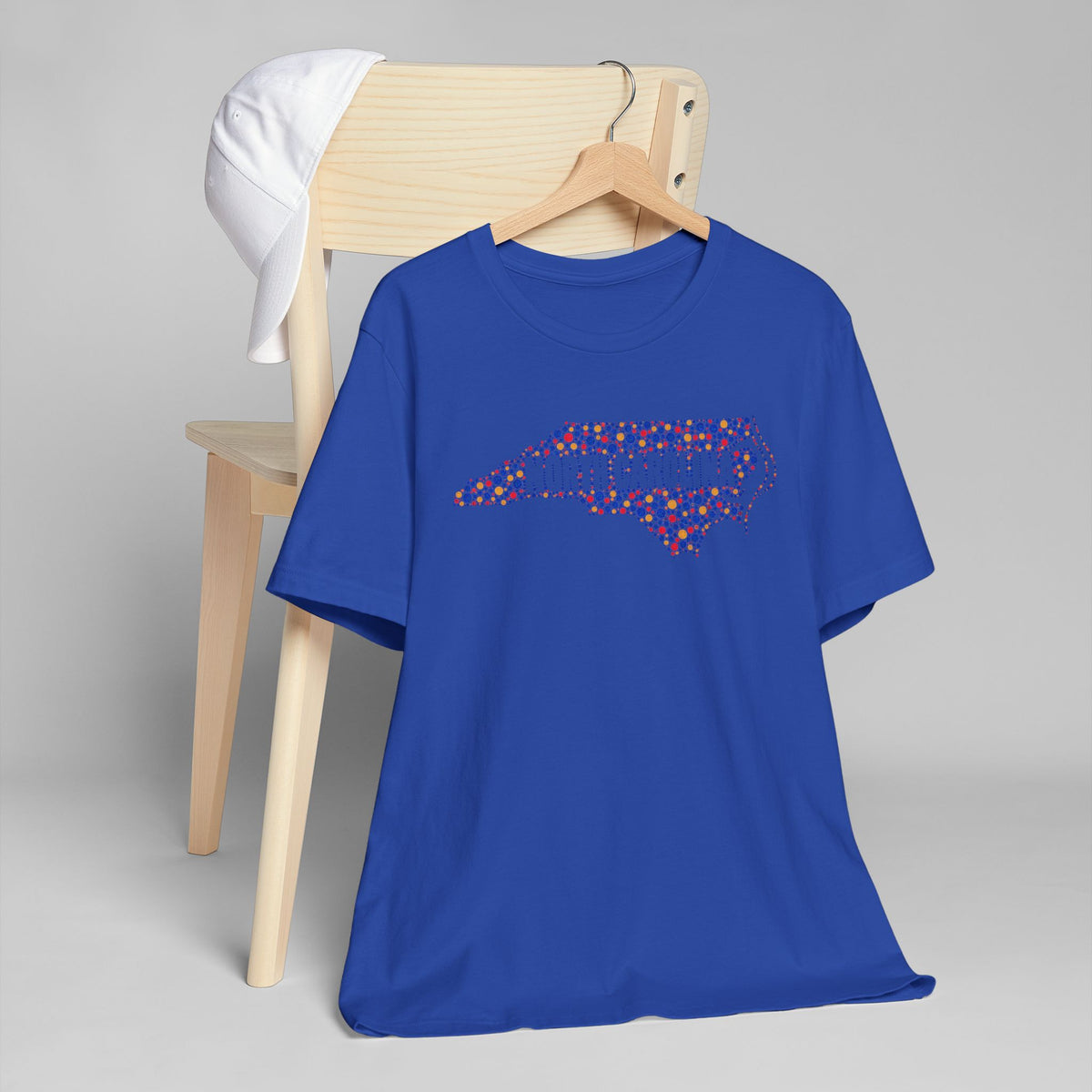 Royal blue T-shirt with colorful North Carolina outline graphic