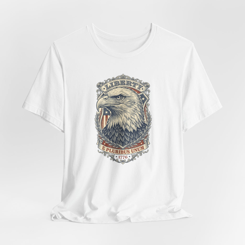 White crew-neck graphic tee with bald eagle head and “Liberty” banner design