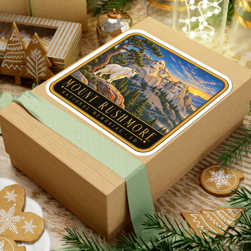 Mount Rushmore vinyl sticker on gift box, rounded square goat and mountain faces artwork