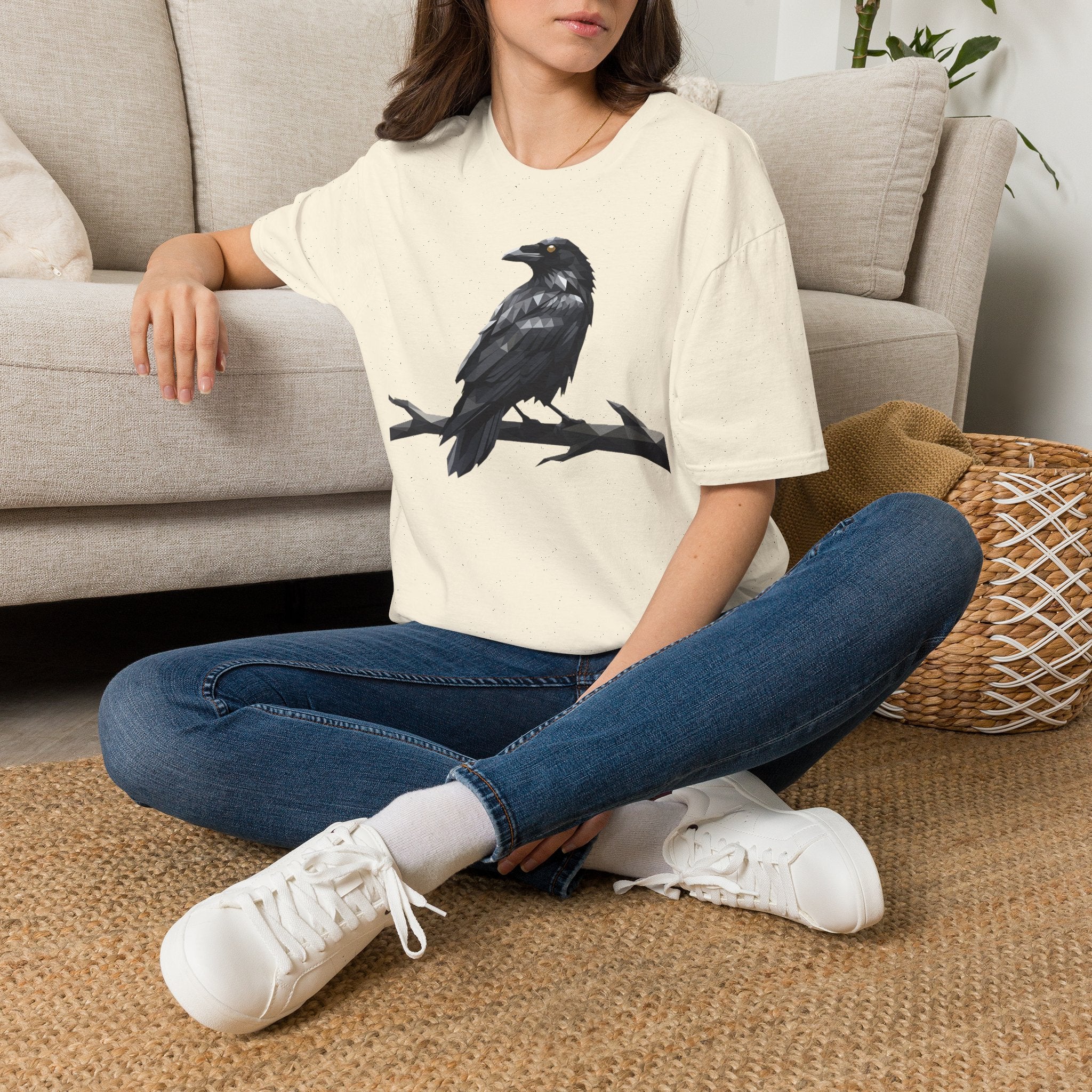 Cream t-shirt with black raven graphic on the front, crew neck short sleeves