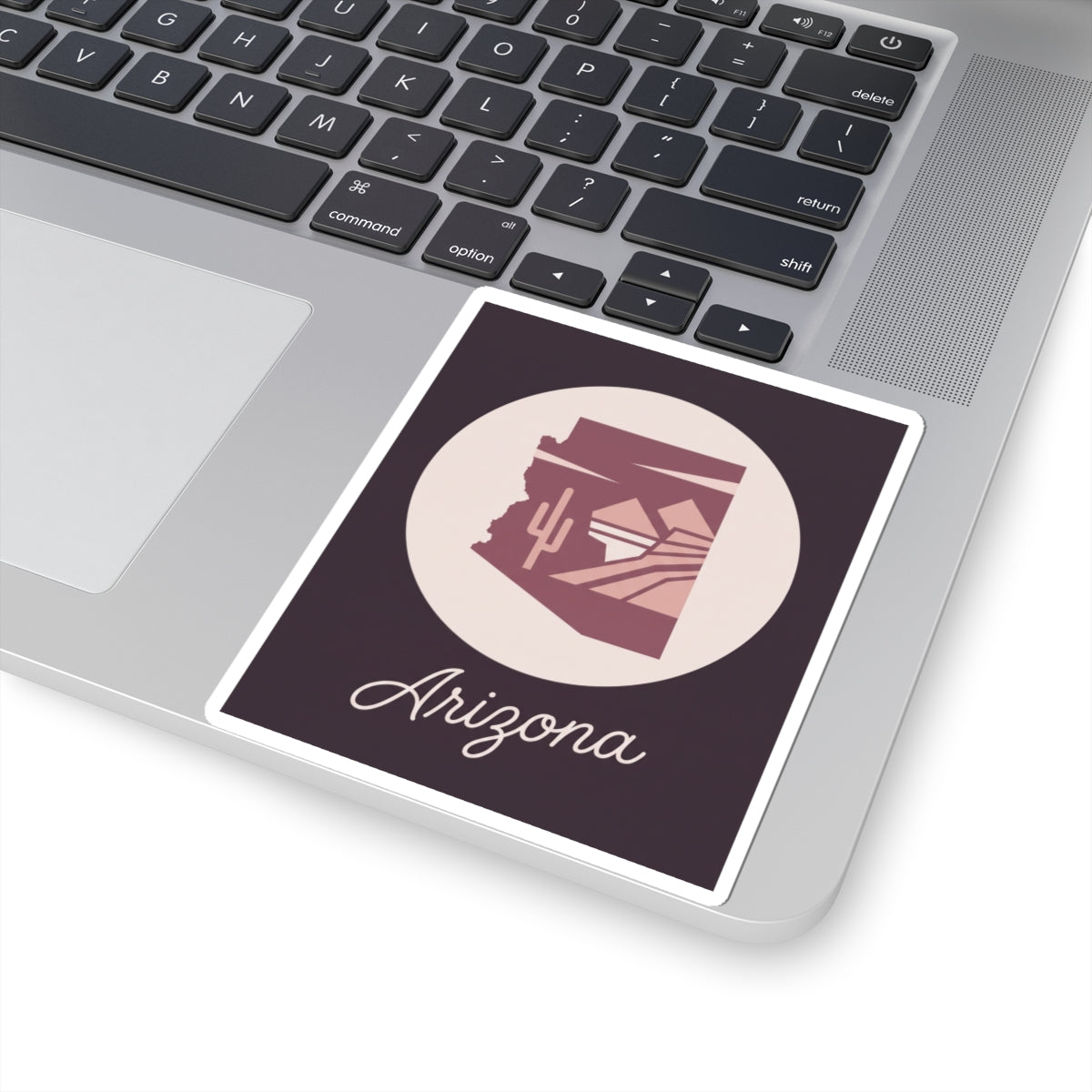 Arizona mauve state silhouette vinyl decal with cream circle and cursive 'Arizona' on backing