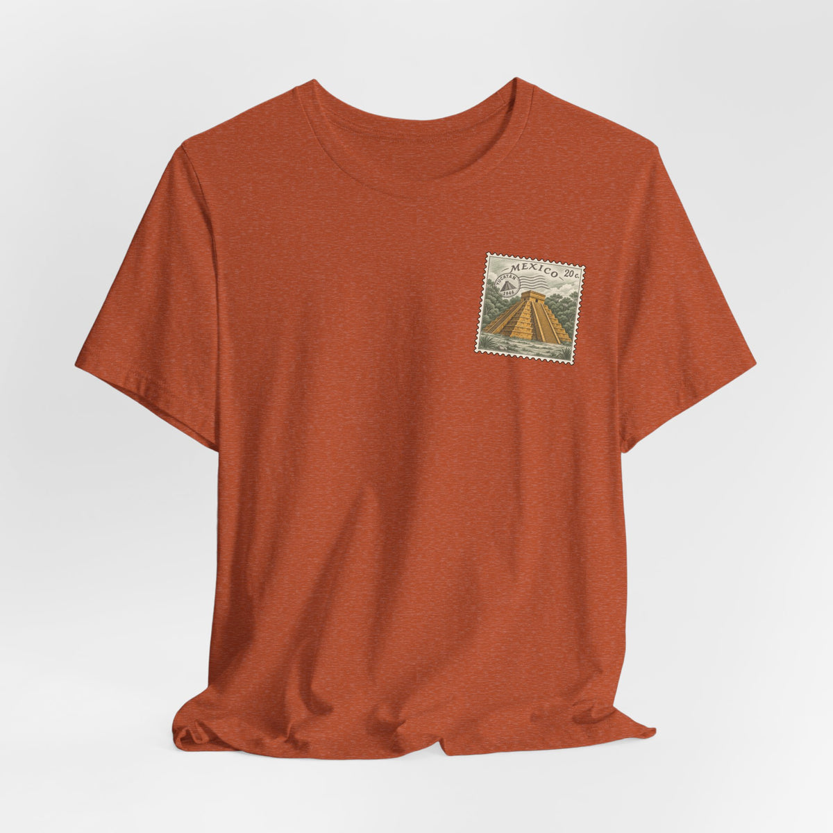 Travel t-shirt, rust orange, front Mexico stamp with pyramid building graphic