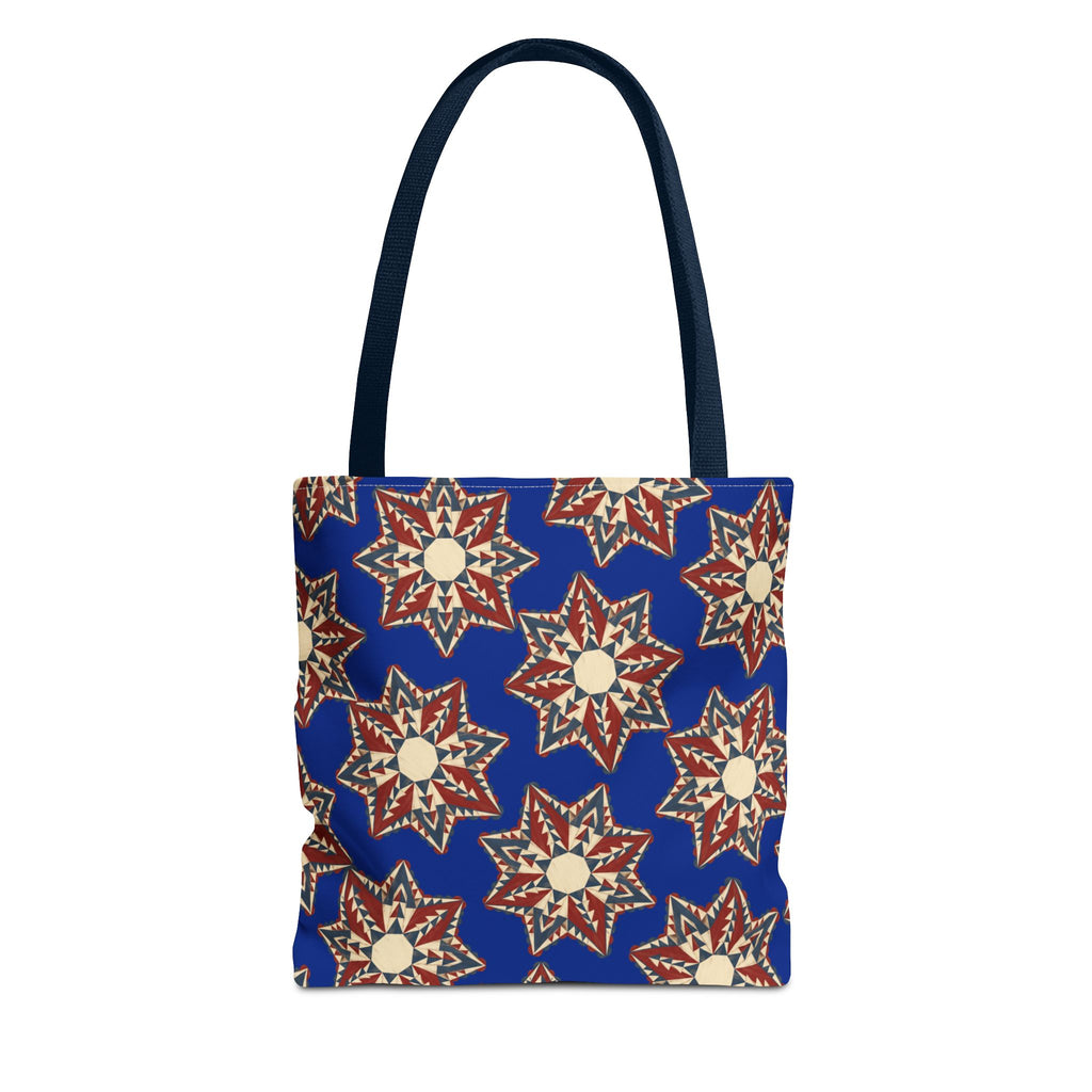 Blue tote bag with starburst floral mandala pattern and navy handles