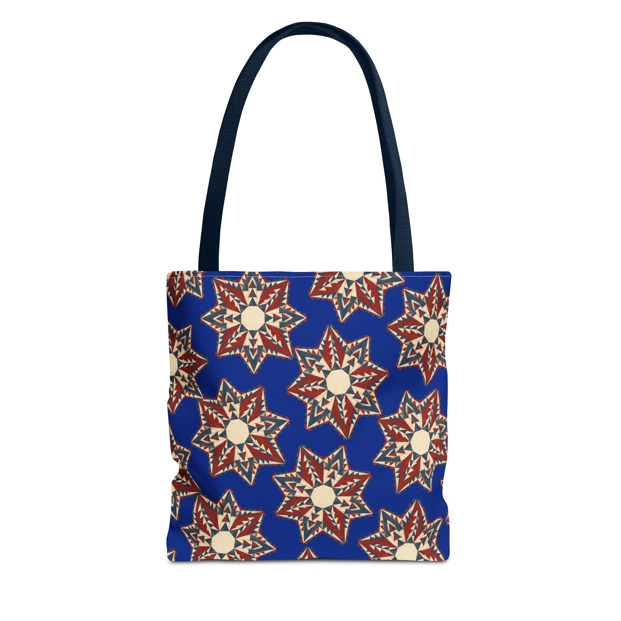 Blue tote bag with starburst floral mandala pattern and navy handles