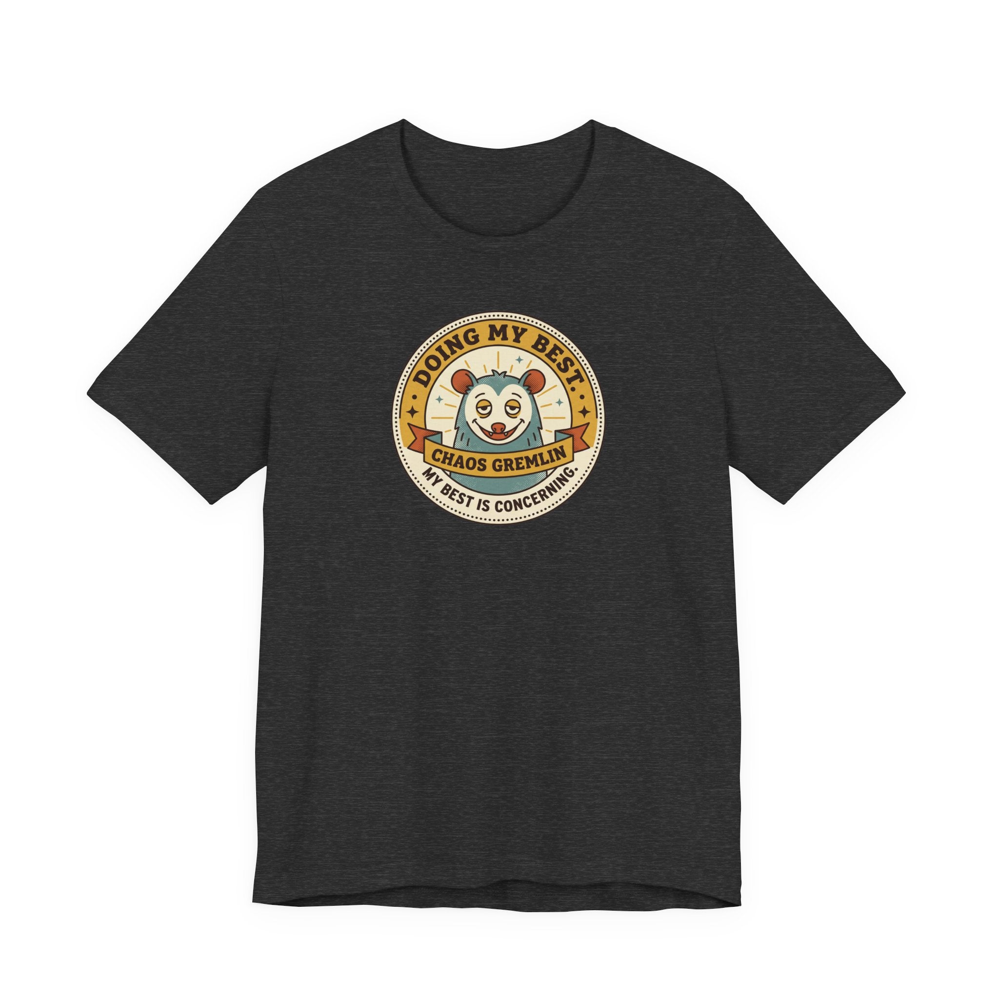 Charcoal T-shirt with round gremlin badge graphic on center chest