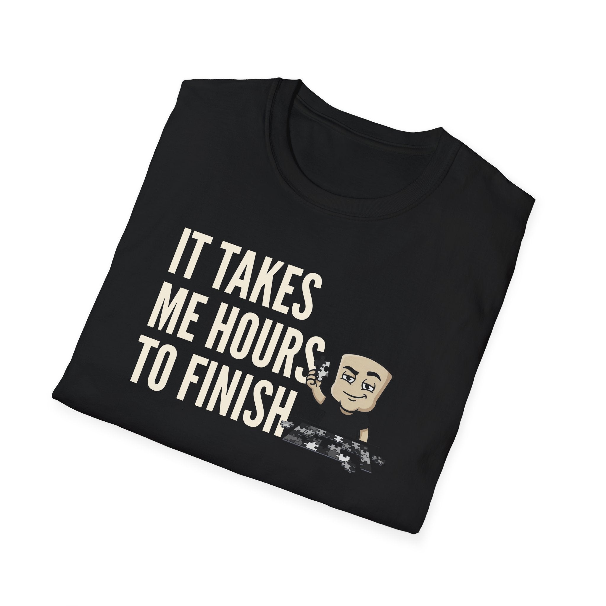 Black T-shirt with 'It takes me hours to finish' puzzle graphic and cartoon face