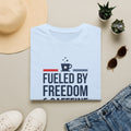 Light blue unisex crew-neck T-shirt with front graphic reading “Fueled by Freedom”