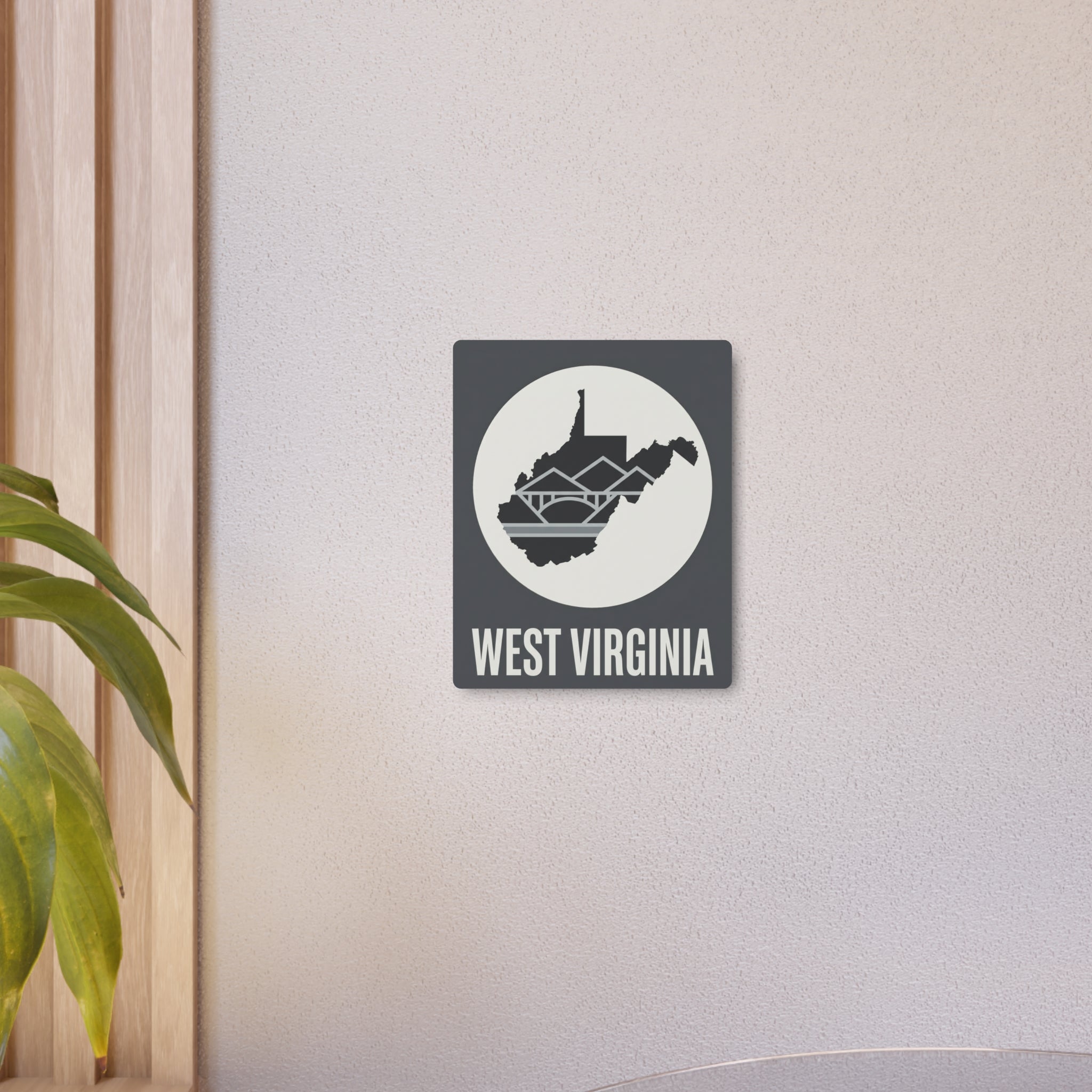 West Virginia metal wall art sign in dark gray with circular skyline and WEST VIRGINIA lettering