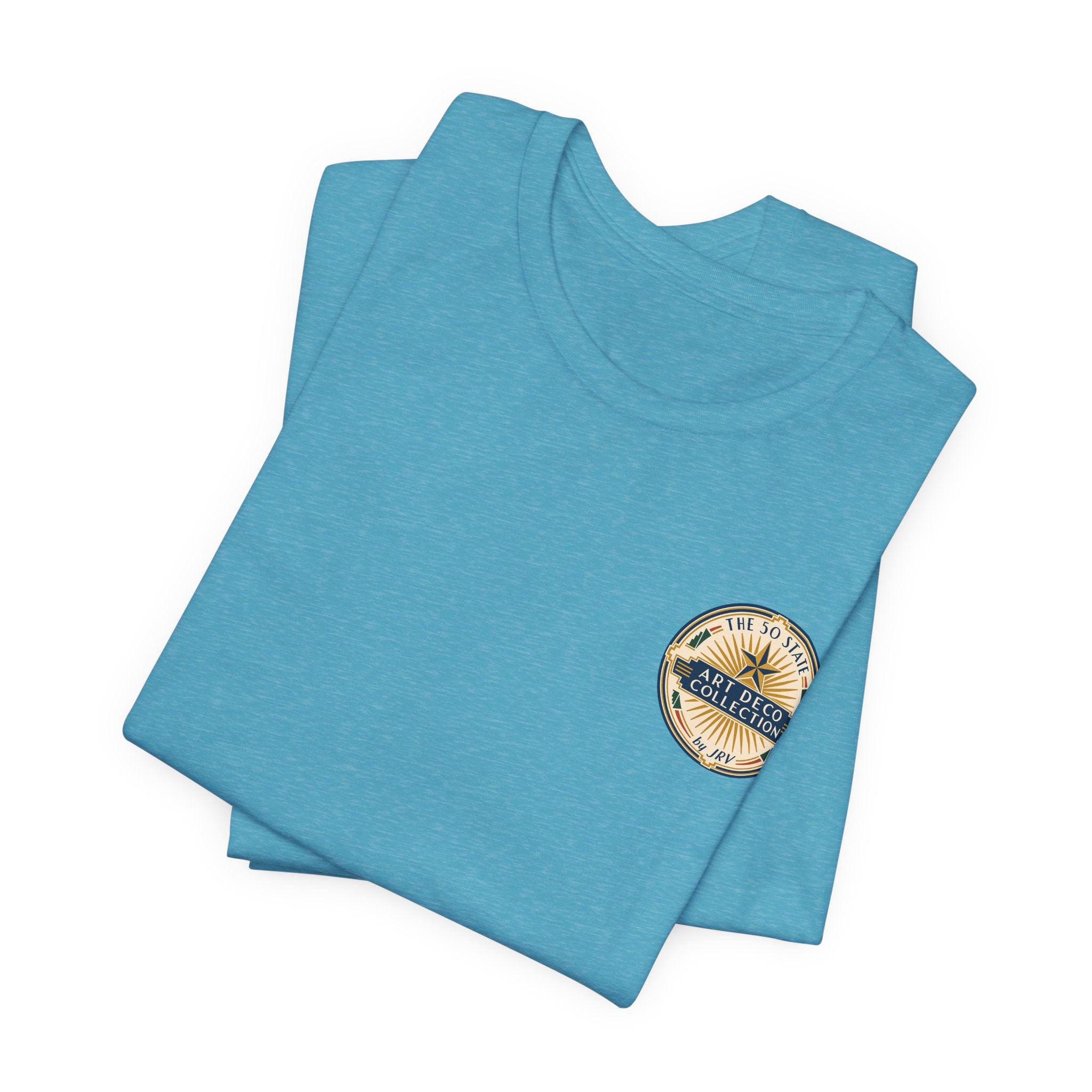 Teal graphic T-shirt with circular badge patch on the chest