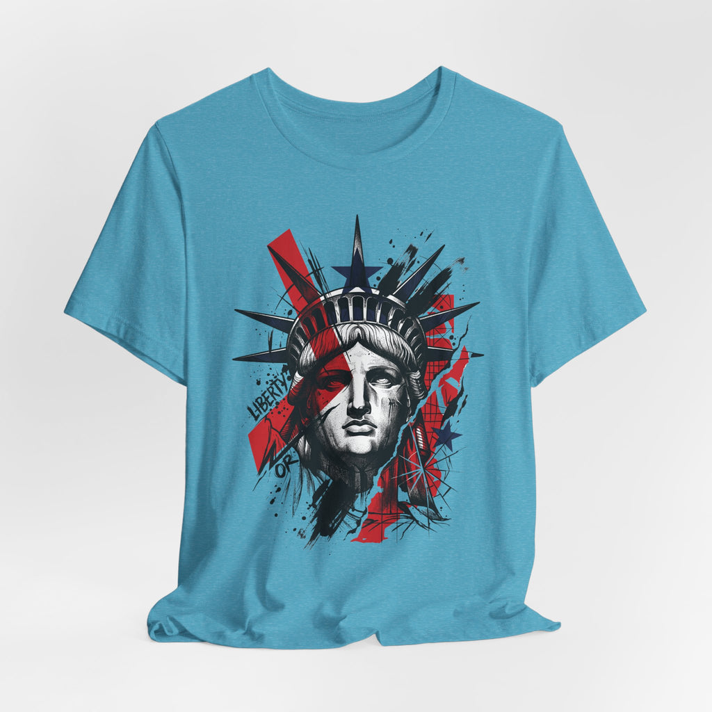 Turquoise graphic T-shirt with Liberty statue head portrait center, red and black splash
