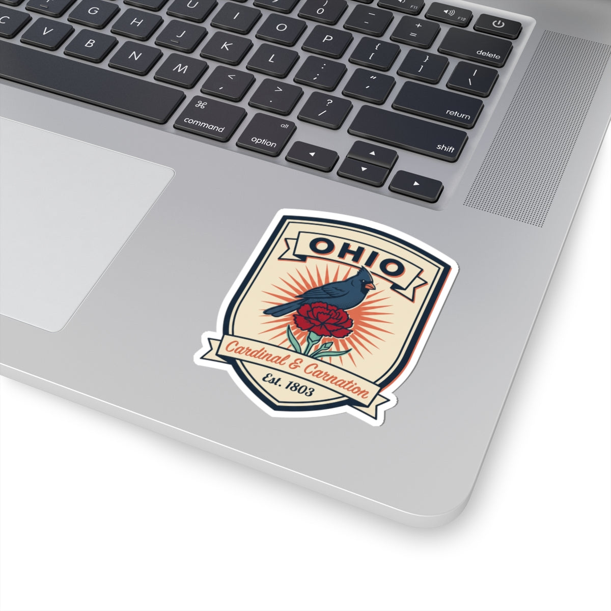 Ohio sticker badge on laptop: blue cardinal with red carnation, Est. 1803
