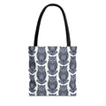 Navy owl pattern tote bag with dark handles, repeating blue-and-white owl illustrations