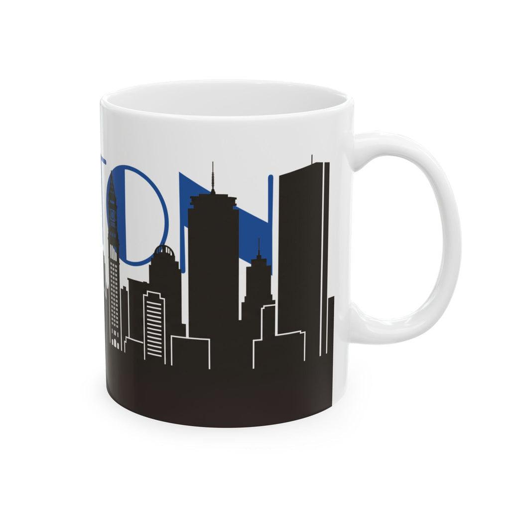 White ceramic mug with blue skyline lettering and black city skyline silhouette