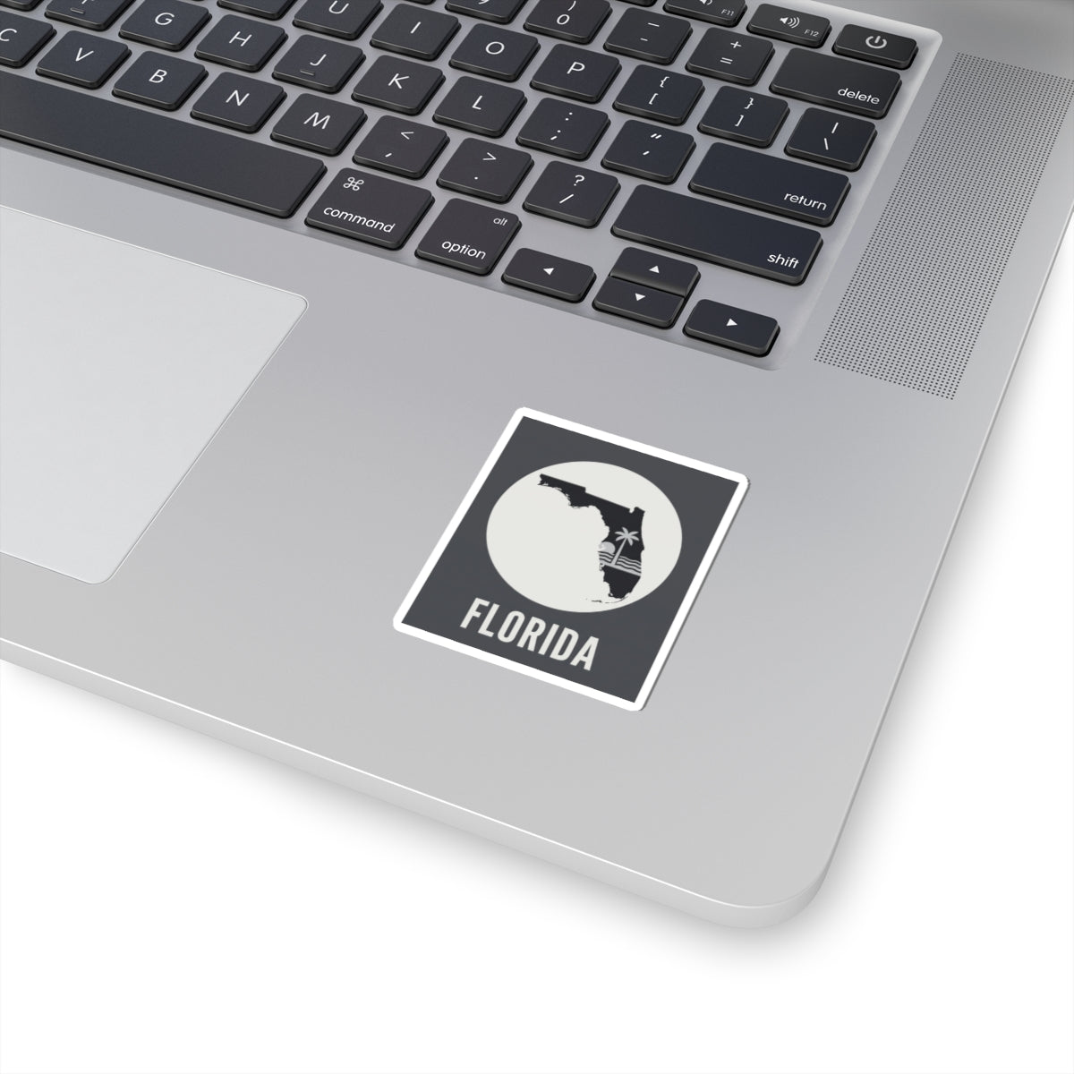 Florida silhouette sticker with black state map and FLORIDA text, square white border