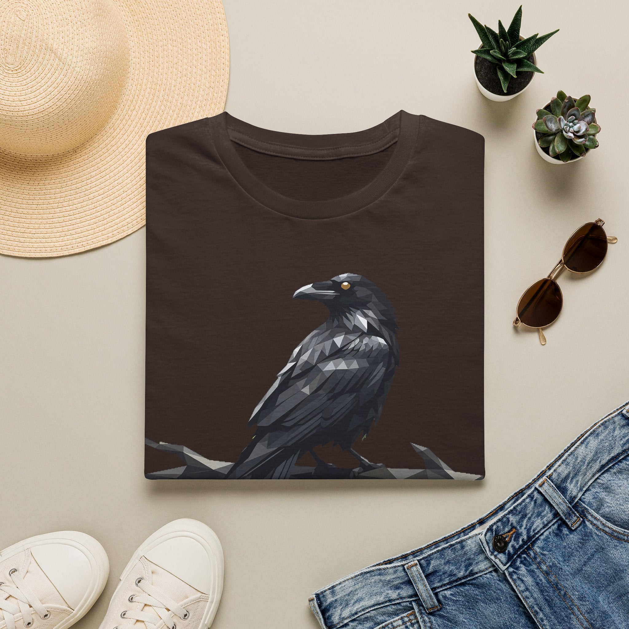 Dark brown raven t-shirt with a sitting crow graphic in gray tones