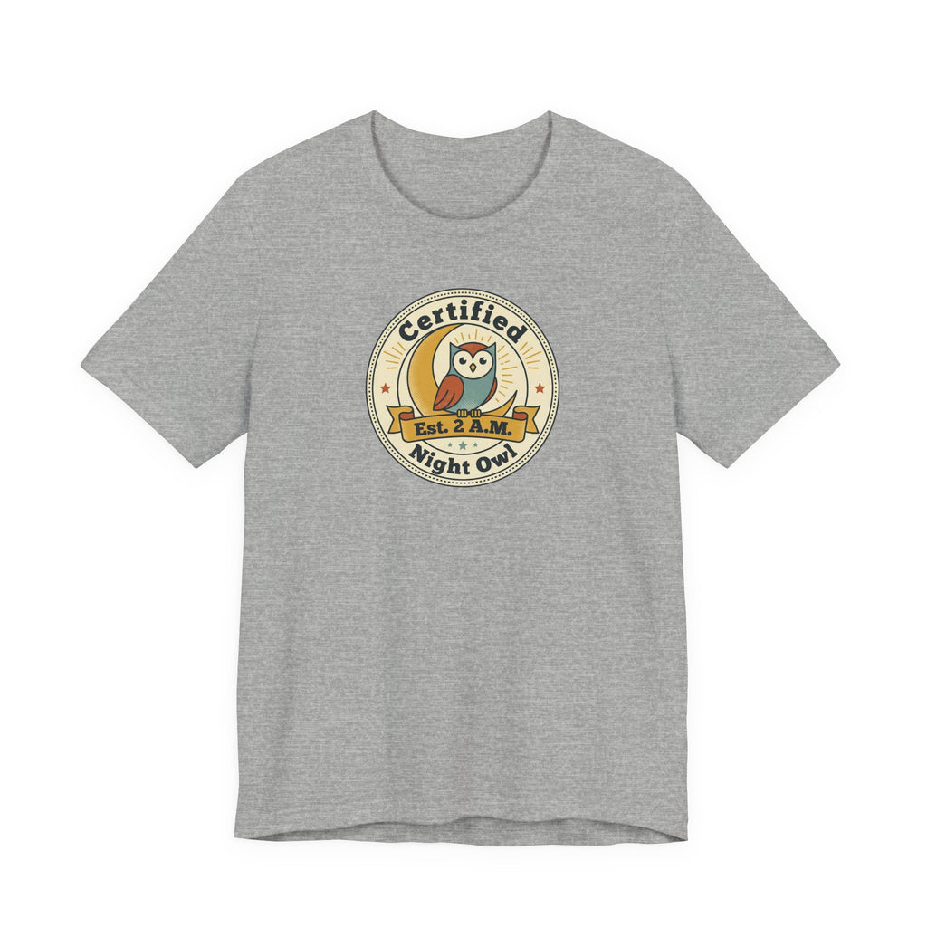 Medium heather gray T-shirt with certified night owl badge graphic on chest