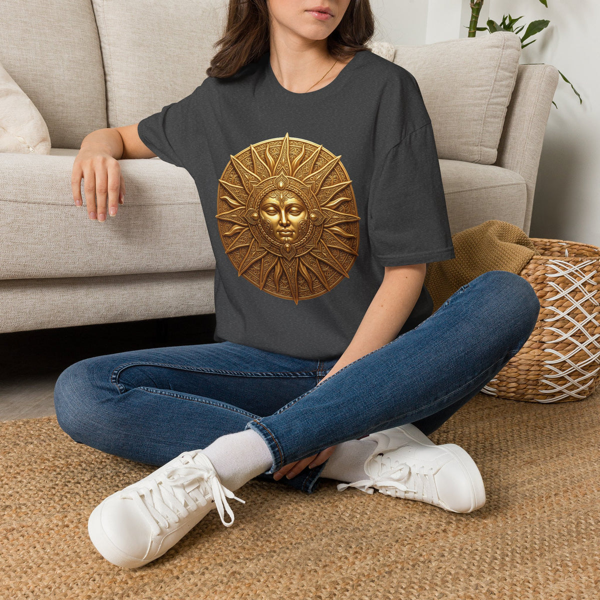 Charcoal grey T-shirt with bronze sun face medallion graphic on front