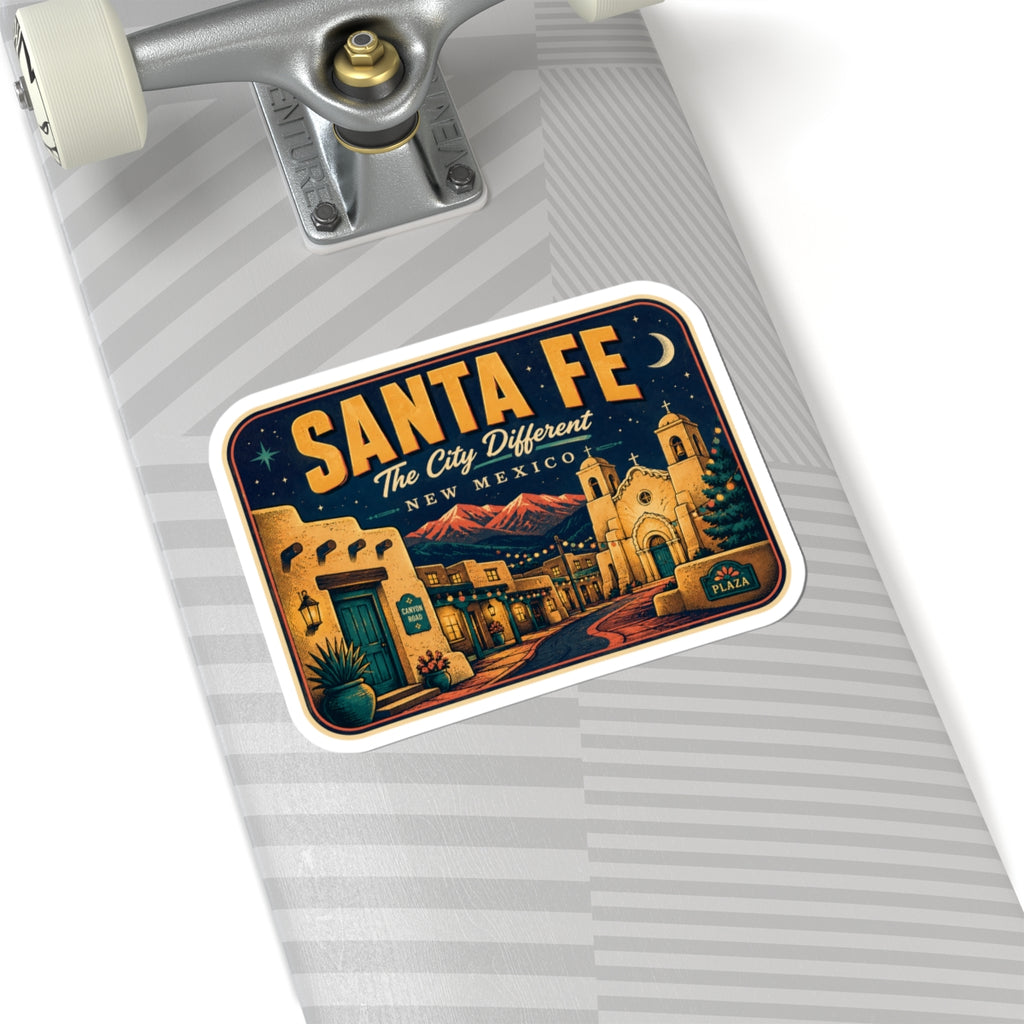 Santa Fe luggage tag sticker on gray striped luggage, rectangular decal with town and church.