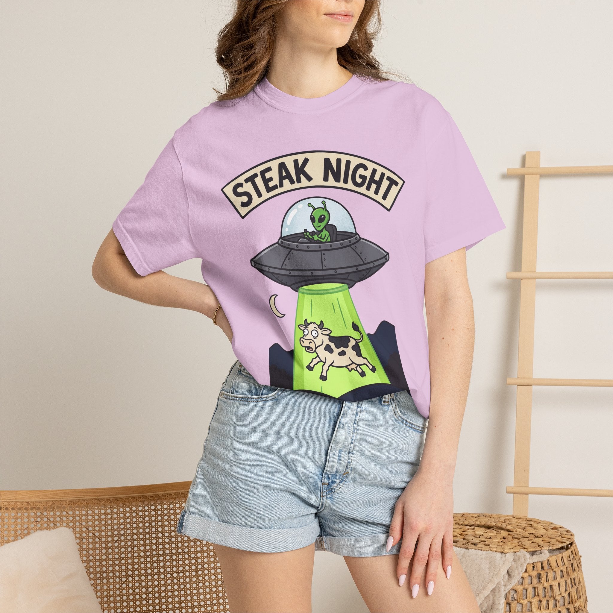 Light pink T-shirt with 'Steak Night' UFO and green alien cow graphic