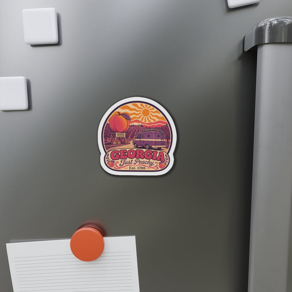 Die-cut magnet on fridge, peach and retro van illustration with 'GEORGIA' text