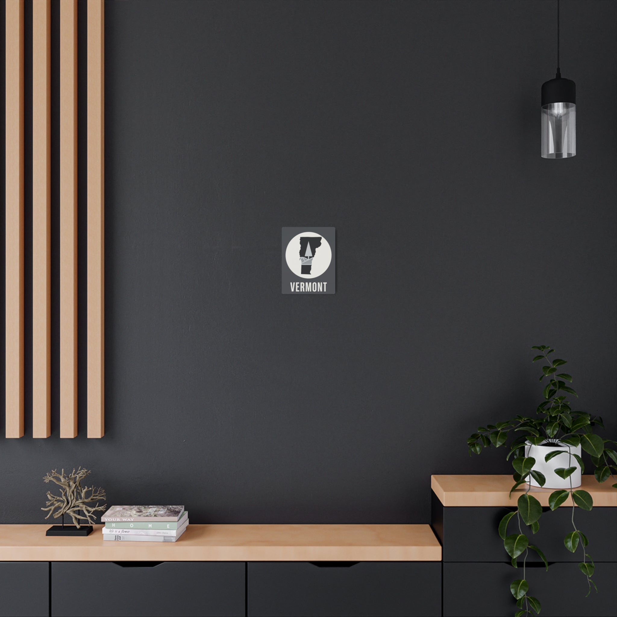 Vermont metal wall decor sign with circular state silhouette and “VERMONT” label.
