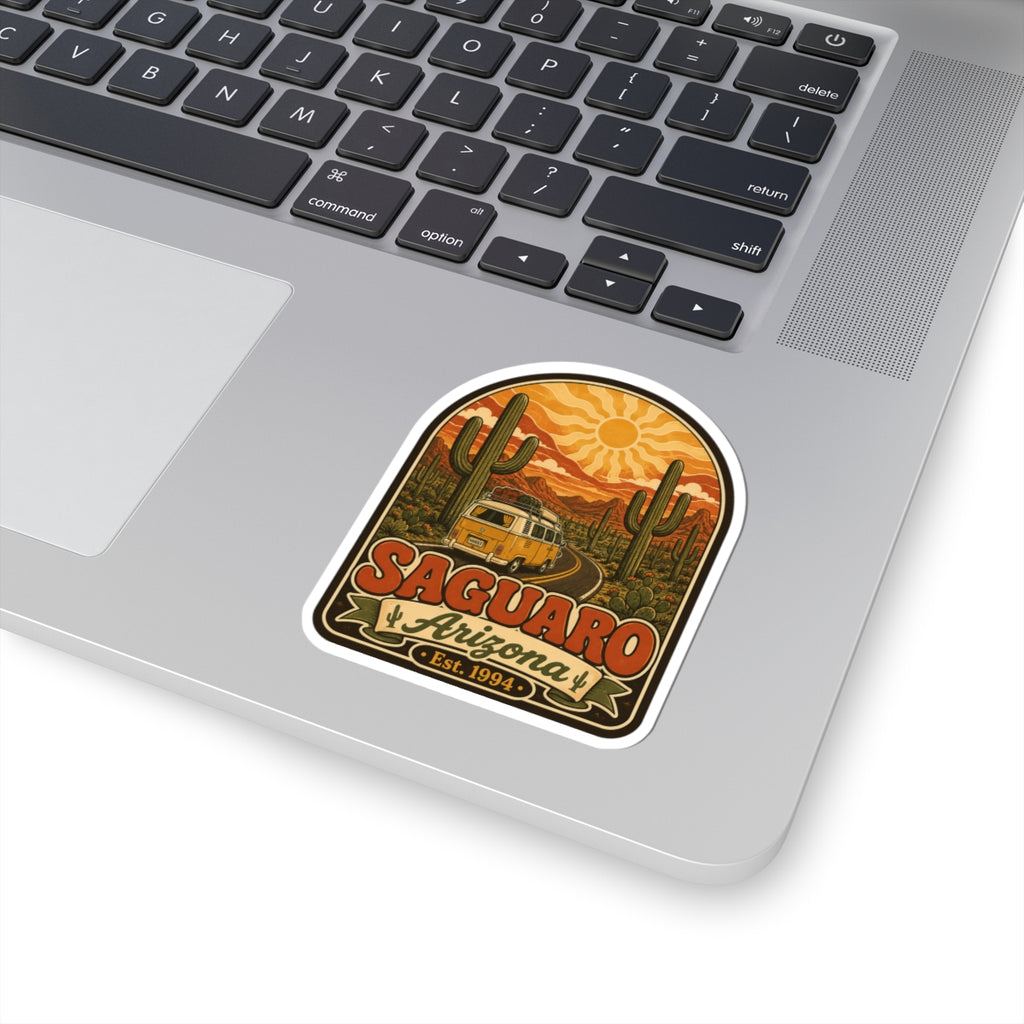 Saguaro Arizona kiss-cut sticker on a laptop keyboard, with cactus and Est. 1994