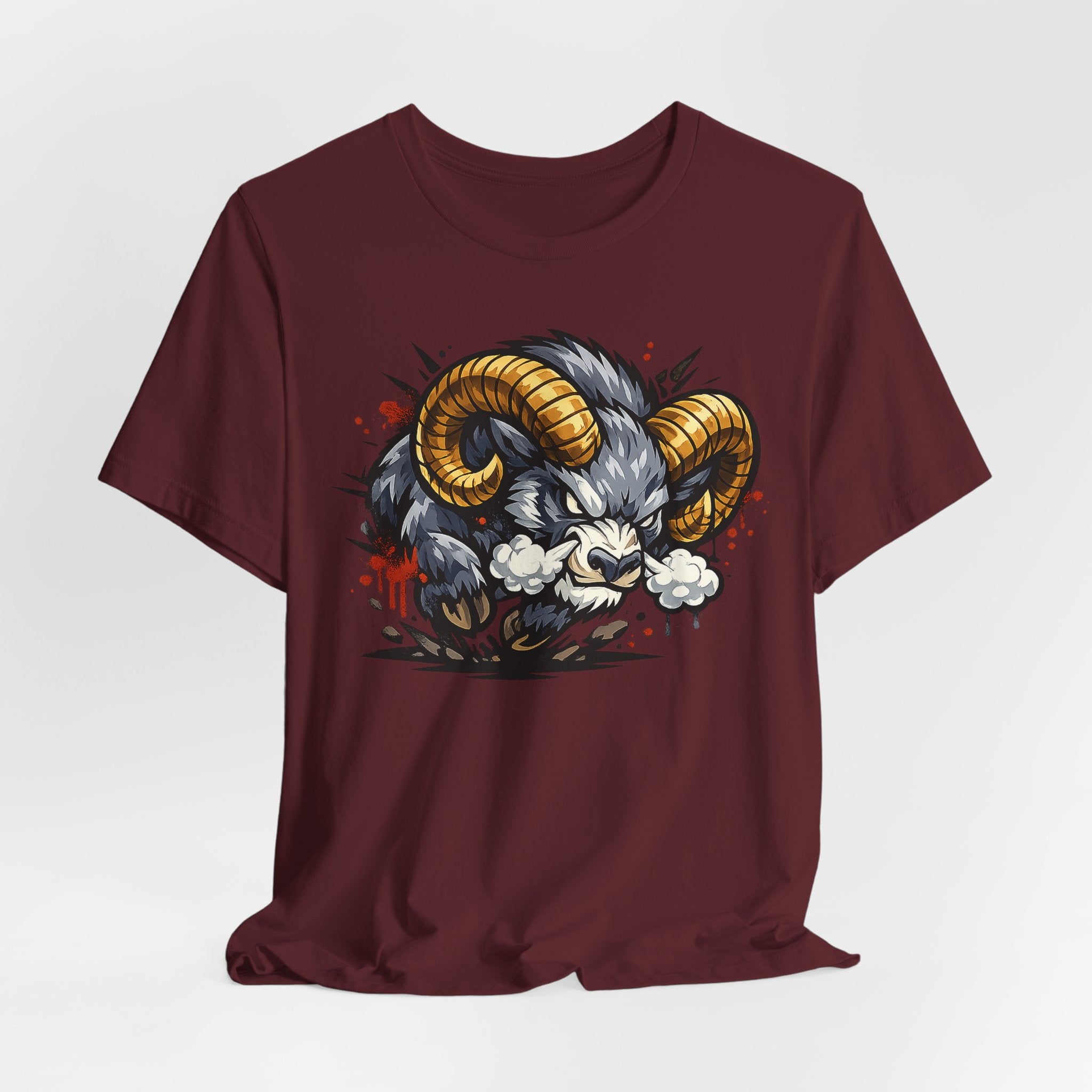 Maroon short-sleeve t-shirt with charging ram head illustration, gold horns and cloud puffs