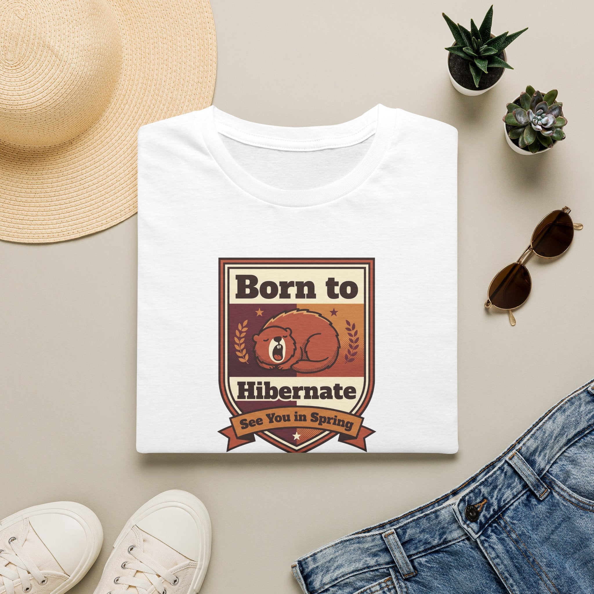 White graphic T-shirt with centered bear "Born to Hibernate" badge print