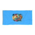 Blue beach towel with colorful skull and tropical floral graphic, rectangular