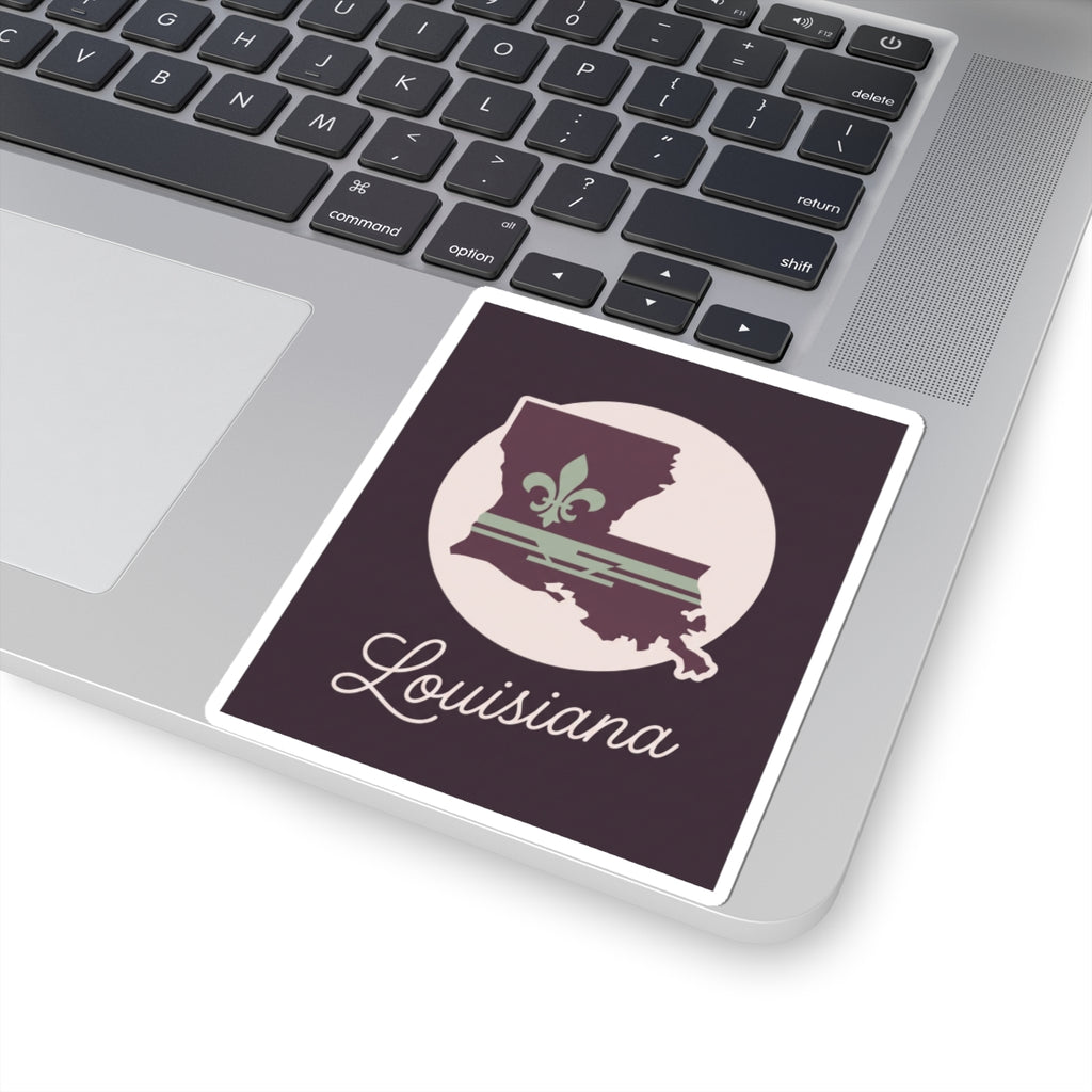 Louisiana silhouette vinyl sticker on laptop lid, mauve Louisiana script in white