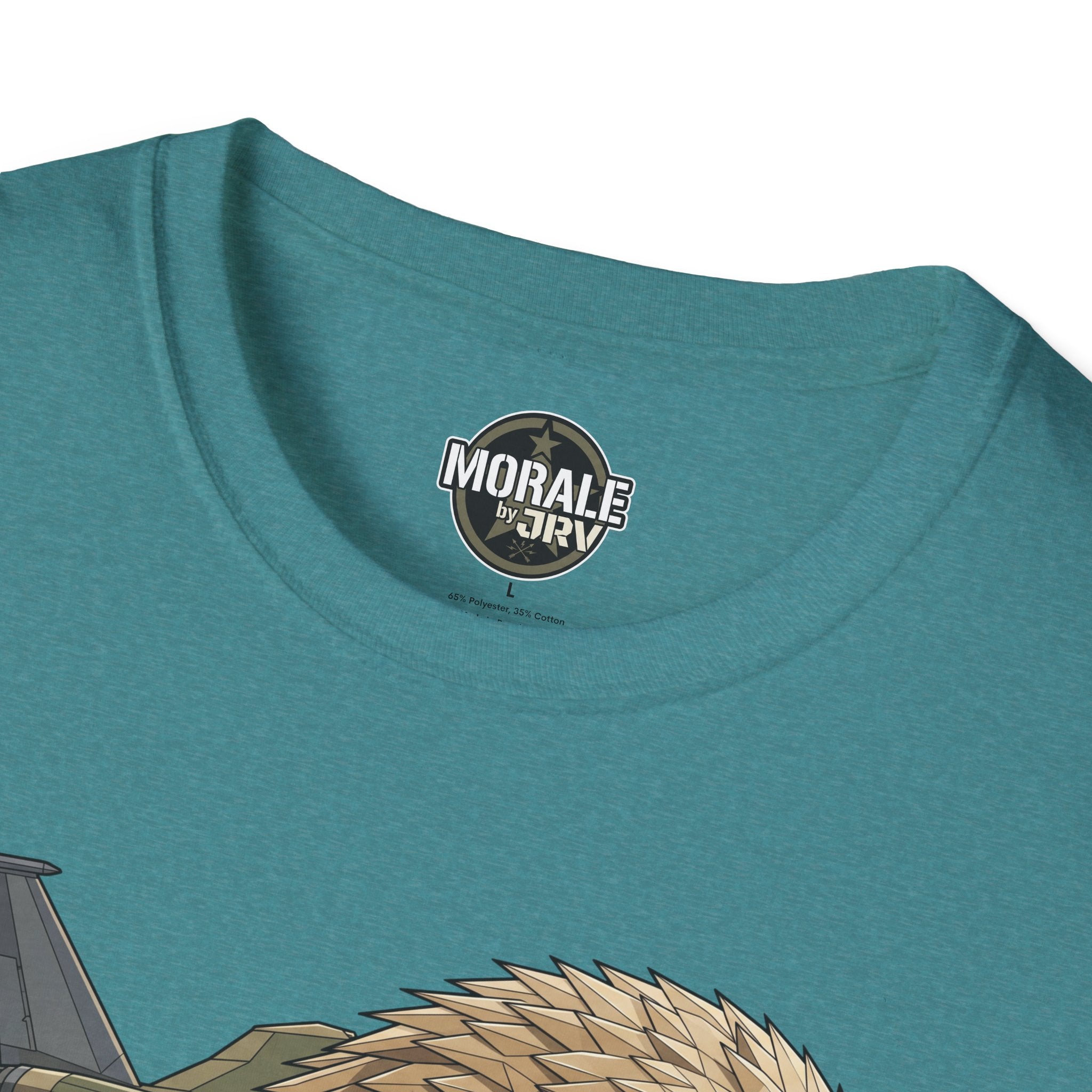 Teal/green T-shirt close-up: “MORAL by JRI” chest badge with fighter jet graphic