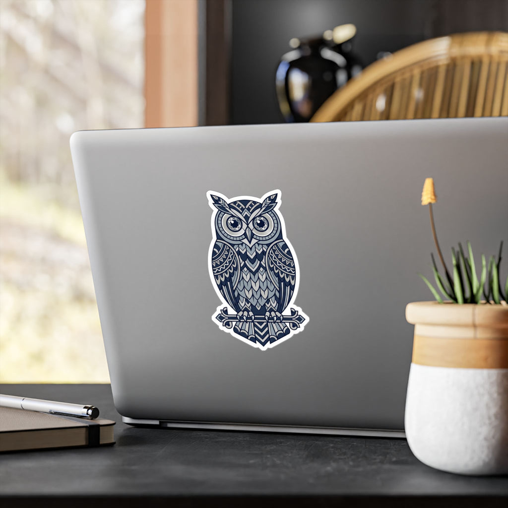 Blue geometric owl vinyl decal with white border on laptop lid