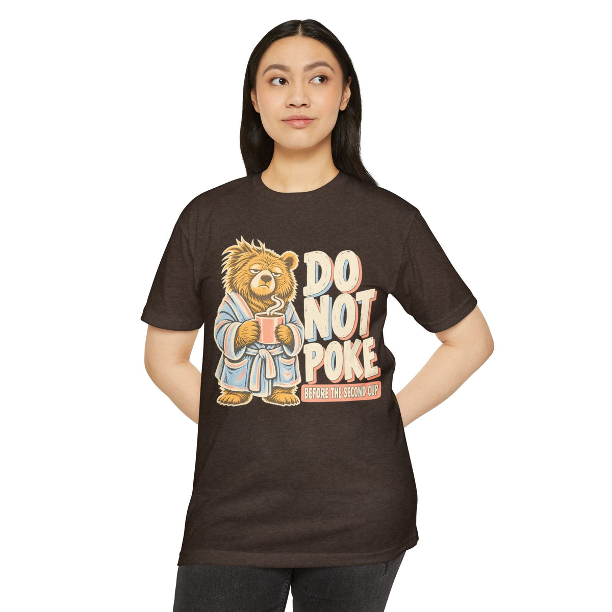Brown t-shirt with grumpy bear holding a cup and “DO NOT POKE” graphic on front.