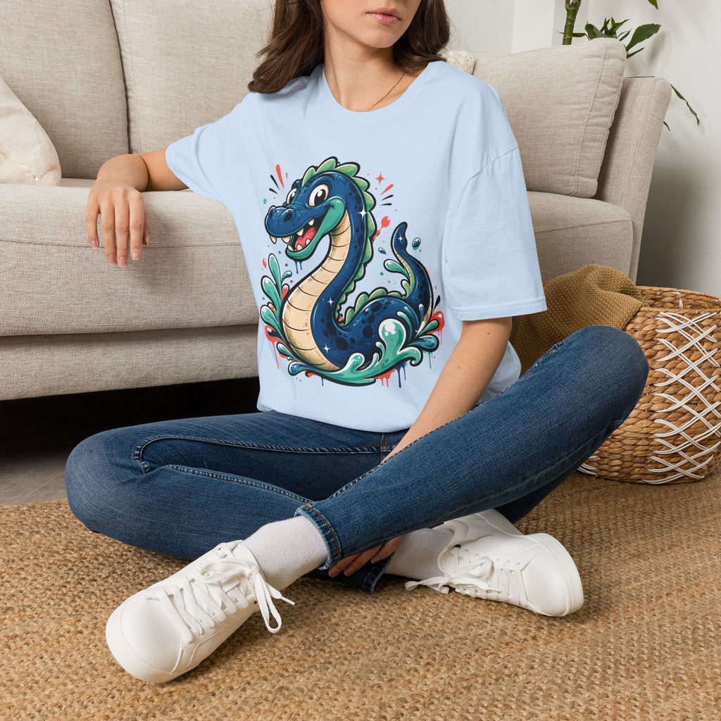 Light blue sea serpent graphic T-shirt worn by model, short sleeves, crew neck