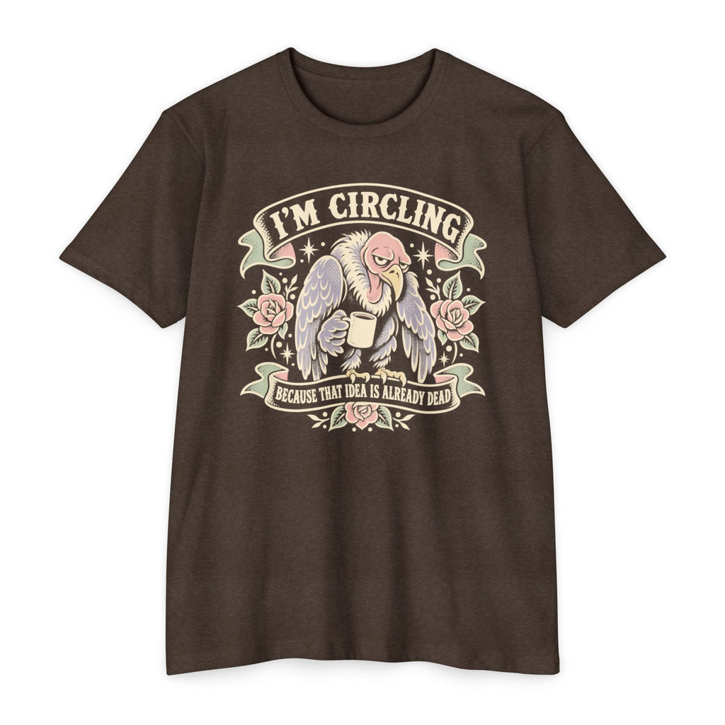 Brown vulture graphic T-shirt with winged face and “I’m circling” text