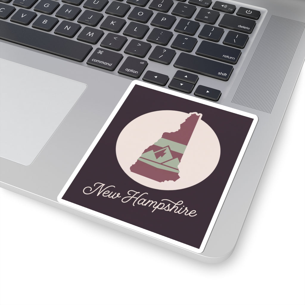 New Hampshire state silhouette kiss-cut decal with mountain colors and cursive 'New Hampshire'