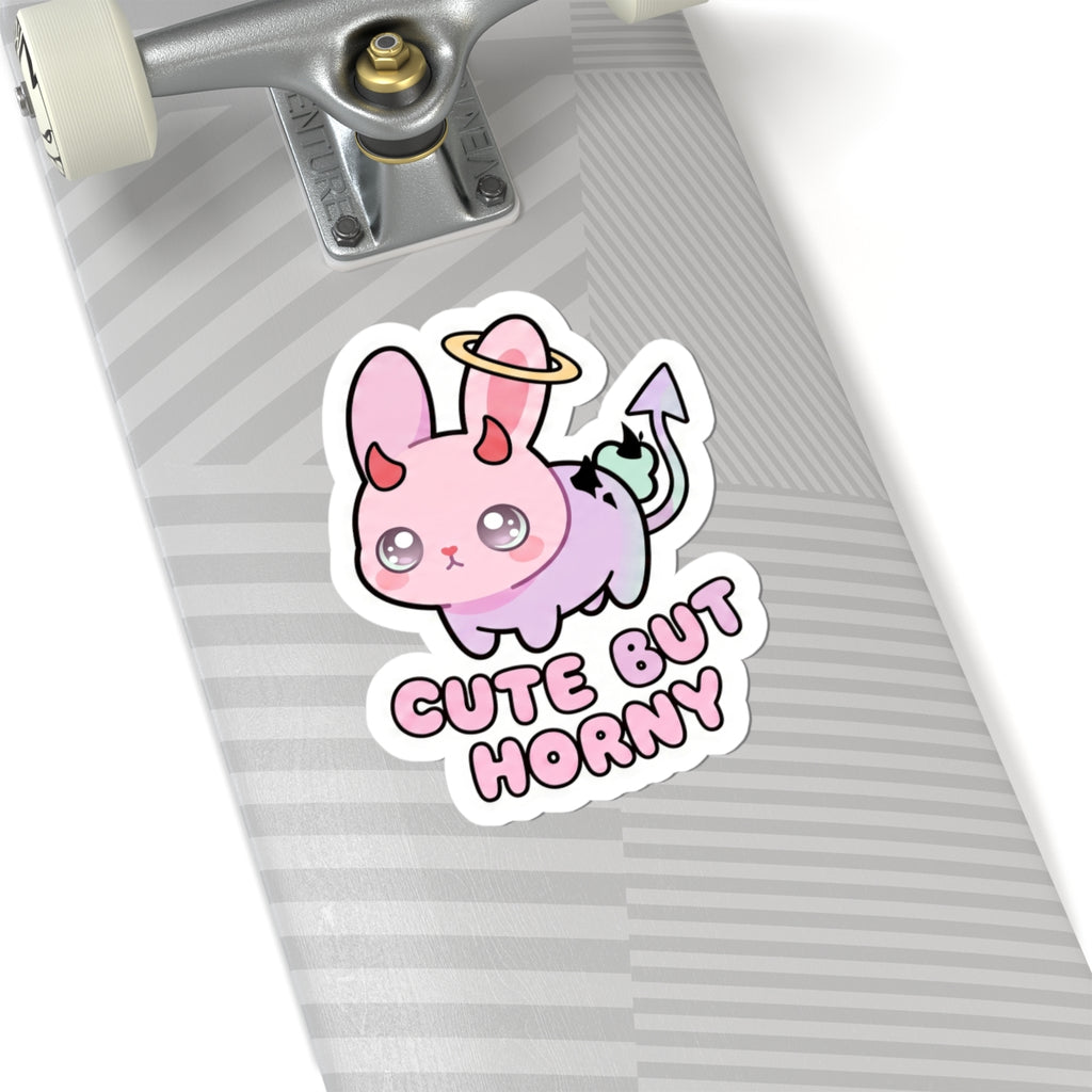 Demon bunny sticker with halo ring and 'Cute But Horny' text on lined planner page