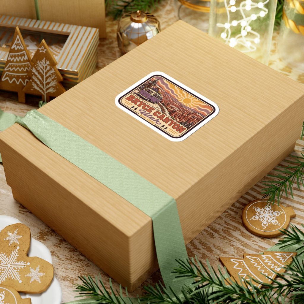 Kiss-cut Bryce Canyon Utah sticker on wrapped gift with retro camper van and hoodoo sunset