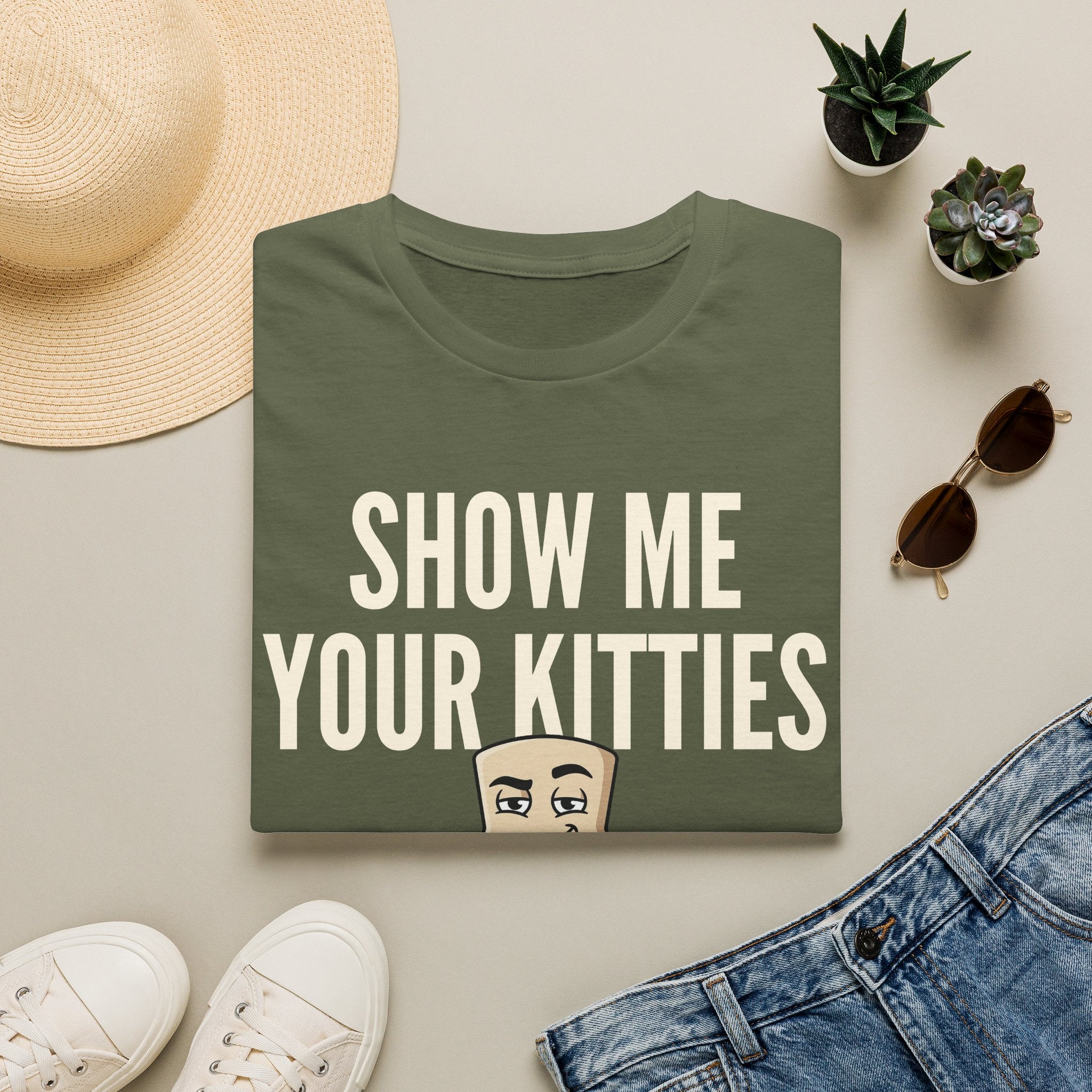 Green T-shirt with "SHOW ME YOUR KITTIES" text and cat graphic