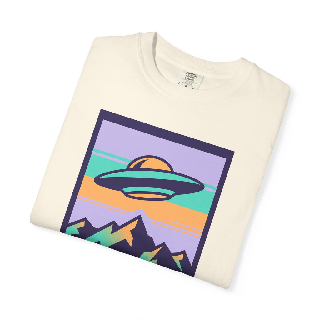 Ivory T-shirt with UFO and mountains poster graphic on the front