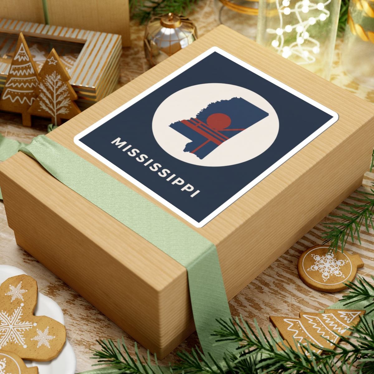 Navy square kiss-cut sticker with Mississippi silhouette, red sun, and slanted MISSISSIPPI text
