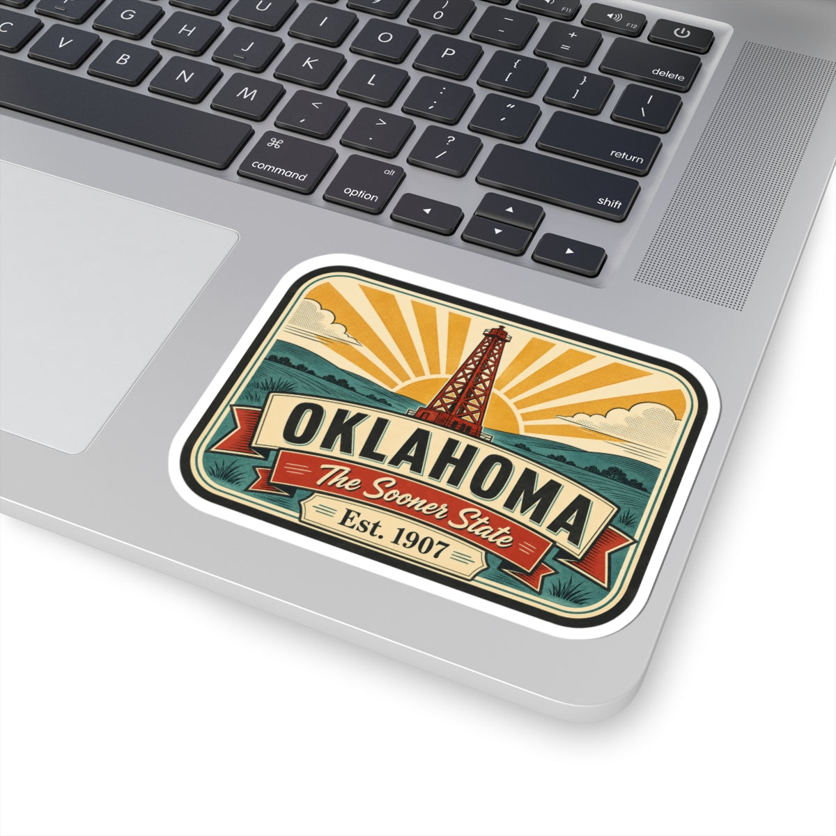 Oklahoma retro oil derrick vinyl sticker with sunburst rays and 'Oklahoma' ribbon
