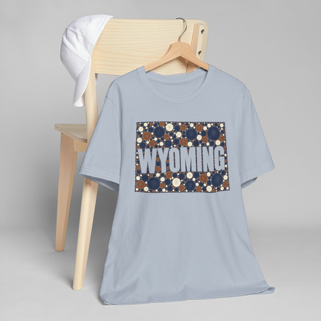 Light blue crewneck T-shirt with polka-dot state map graphic reading WYOMING