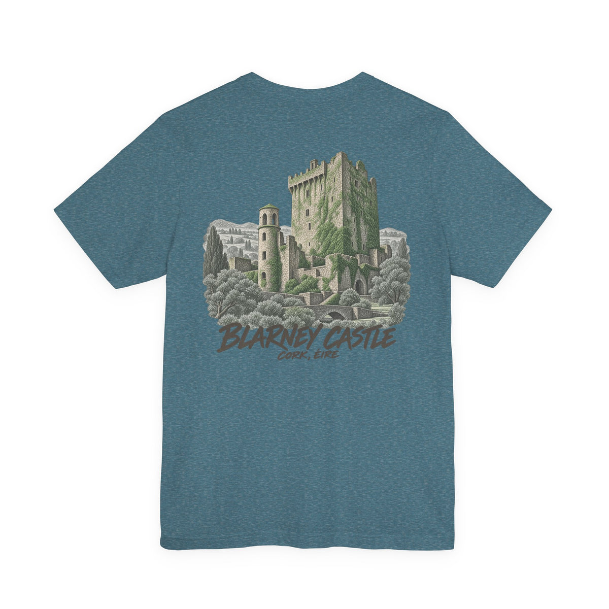 Teal heather T-shirt with large castle graphic and vintage-style text on the back.