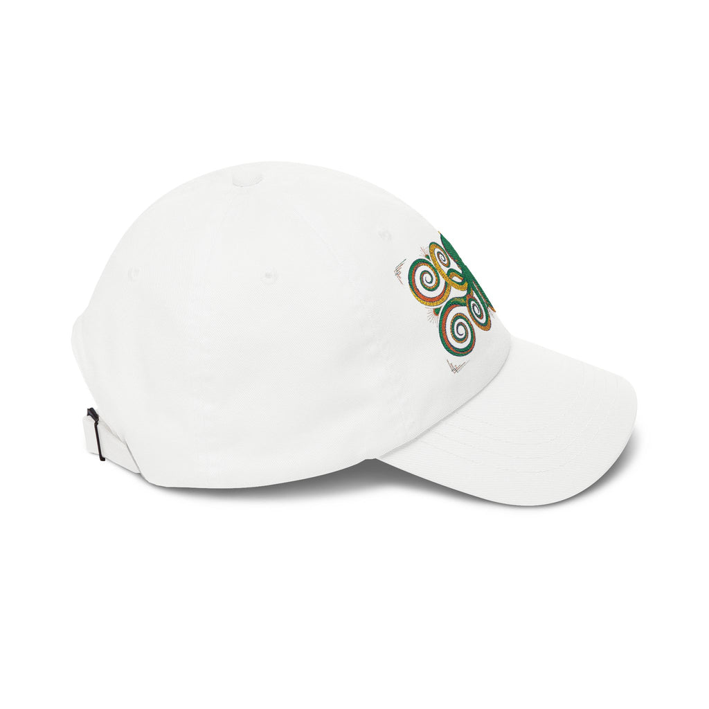 White baseball cap, side view, with green-and-gold swirl embroidery on the crown
