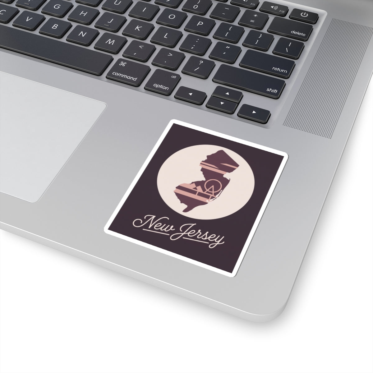 Square kiss-cut New Jersey sticker with state silhouette and cursive “New Jersey”
