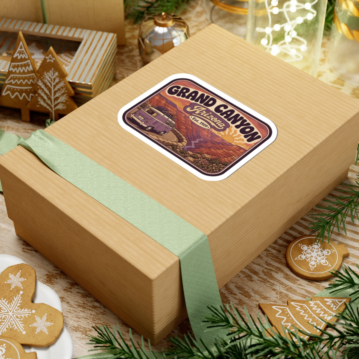 Grand Canyon sticker on gift box with ribbon, showing canyon landscape and "Est. 1919"