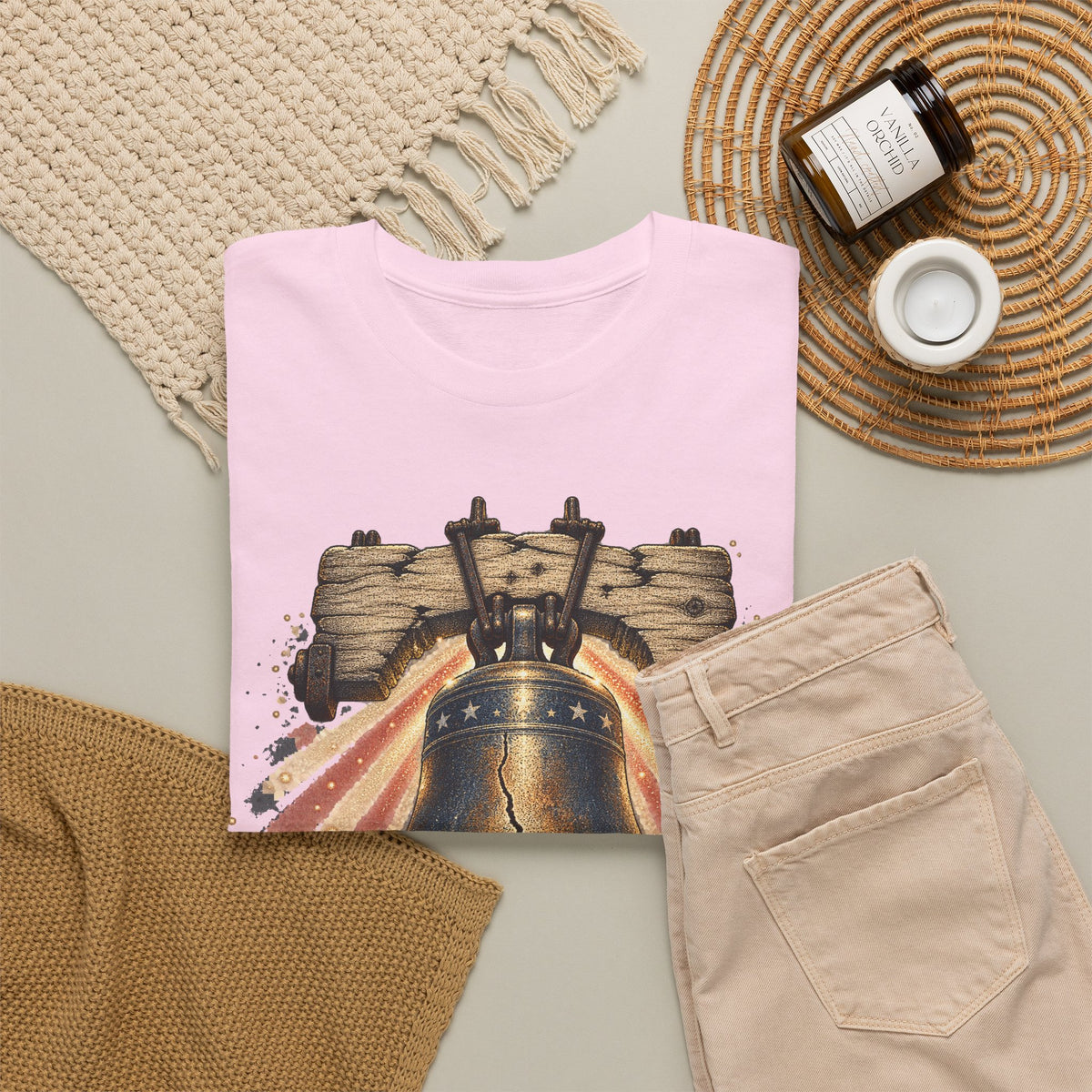 Pink short-sleeve t-shirt with liberty bell graphic on the front
